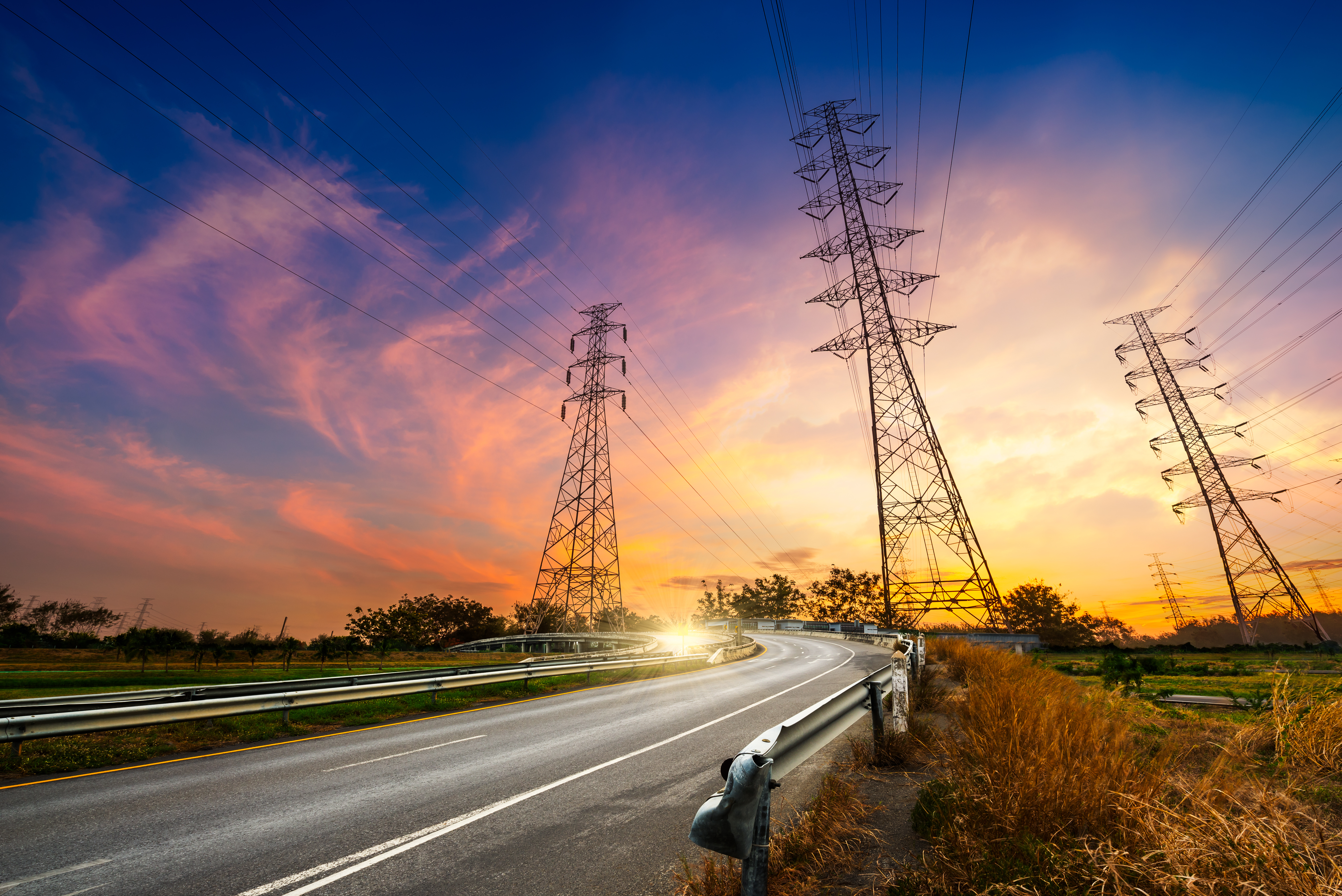 Power poles at sunrise